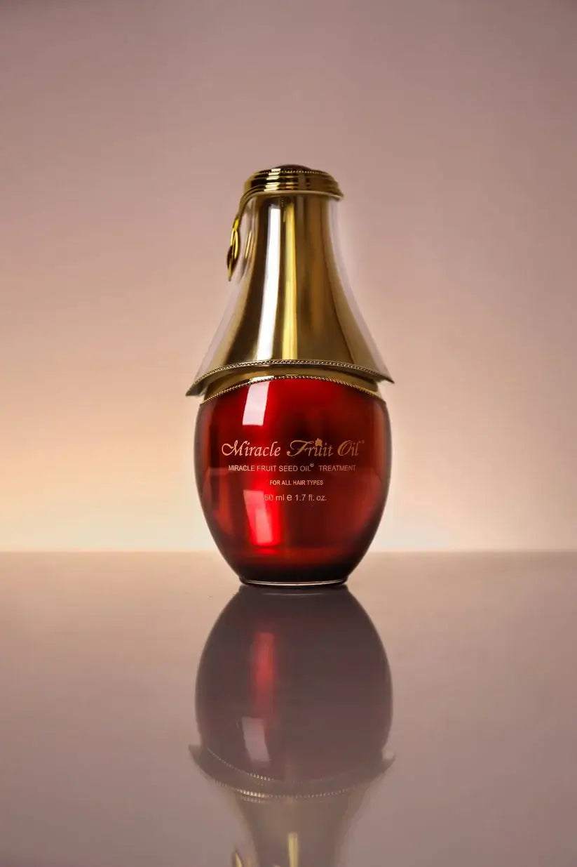 Vivandi Miracle Fruit Oil 30ml bottle with a golden cap reflecting on a surface.
