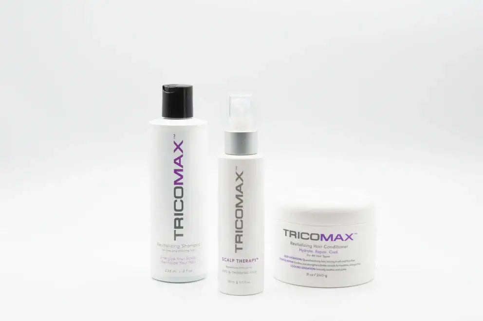 Clean Hair & Scalp Therapy System products including shampoo, scalp spray, and conditioner by TRICOMAX.
